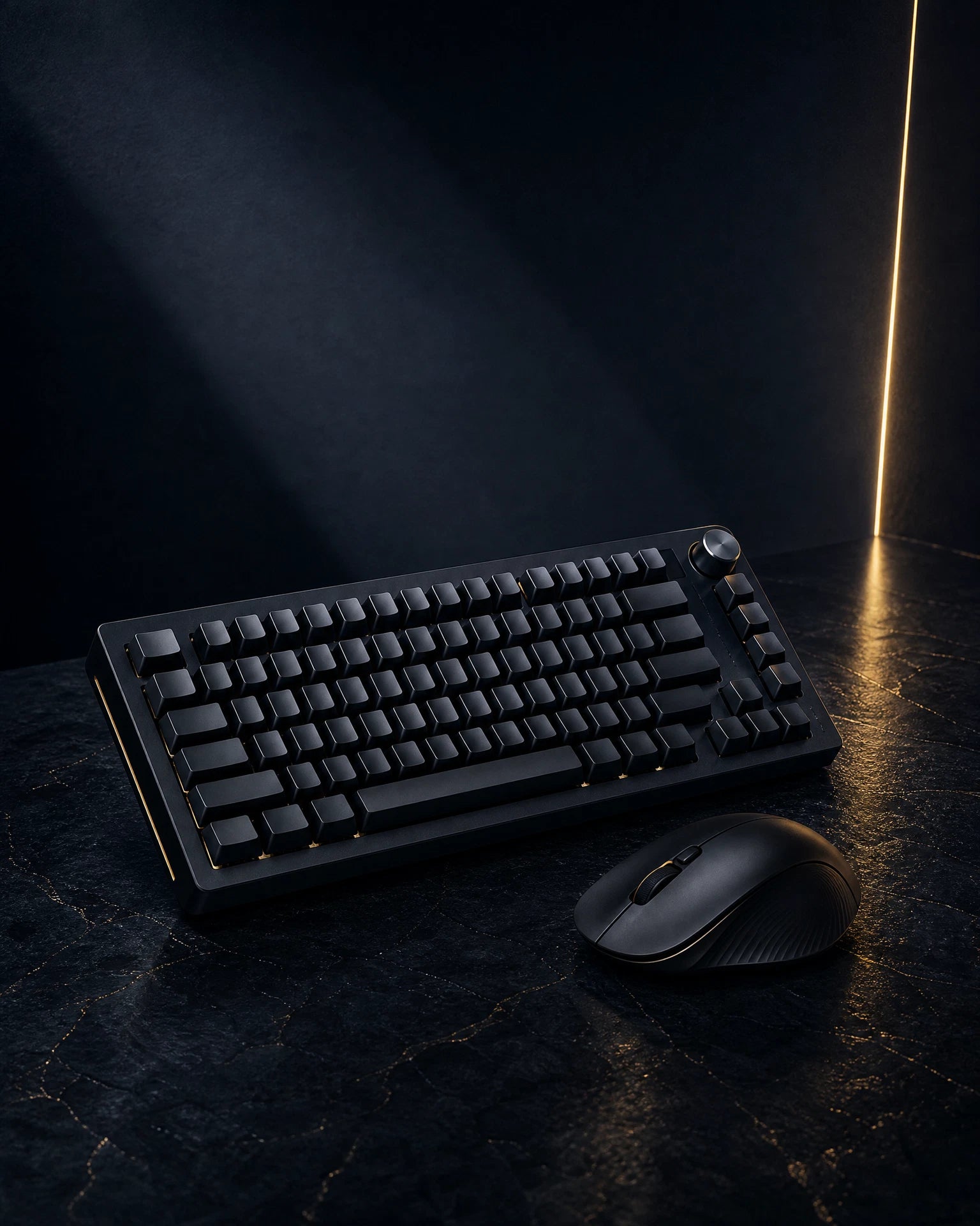 Keyboard and mouse on a dark navy desk